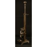 An early 20th century cast iron novelty fire iron stand, cast as a bear, Rd.No. 705370-1924