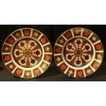 A pair of Royal Crown Derby 1128 pattern side plates, 21.5cm diameter, printed marks in red, first
