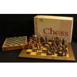 A Battle of Culloden Chess Set by Studio Anne Carlton, boxed; another chess set; a chess board