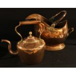A Victorian copper kettle, acorn finial; a helmet shaped copper coal scuttle, late 19th century (2)