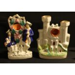 A 19th century Staffordshire flatback pocket watch holder, Shepherd and Shepherdess, 31cm; another