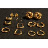 A pair of 9ct gold twisted knot earrings; five pairs of 9ct gold earrings, two odd 9ct gold