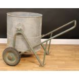 A water carrier street cart, galvanised barrel, tubular frame, the barrel 61cm high, 48cm wide, 65cm