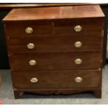 A George III mahogany chest of drawers, crossbanded rectangular top above two short and three