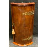 A 19th century mahogany wall hanging corner cupboard, brass hinges, 69cm high.