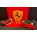 Motor Racing interest - a Burago Ferrari model Scaglietti 612 model car, boxed; XXL black jacket