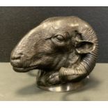 A cast bronze Rams head wall mask, 14cm x 23cm.