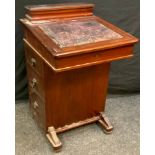 A late Victorian piano top Davenport desk, hinged sloping top enclosing pigeon holes, three