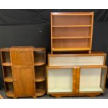 An Art Deco walnut bureau, fall front enclosing a writing surface and pigeon holes above a