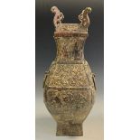 A contemporary Chinese Archaic style bronze jar and cover, drop loop ring handles, 35.5cm high.