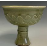 A contemporary Chinese celadon green pottery stem cup, 13cm diameter.