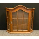 A late 20th century oak single door wall hanging display cabinet, 66cm high, 69cm wide, 14.5cm deep.