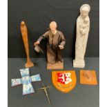 Religious items - a Stone obelisk Maddona & Child; carved treen wall plaque Christ, clay figure of