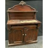 A Victorian mahogany sideboard shaped back over single frieze drawer, a pair of panelled doors,