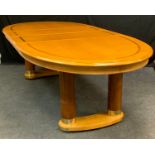A Stanley furniture company contemporary oval extending dining table, 75cm high 277cm long A Stanley