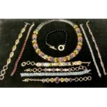 Jewellery - a 925 silver multi stone collar necklace, alternate set with rows of three oval garnets,