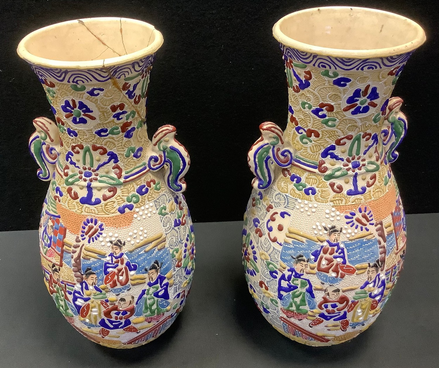 A pair of Japanese Satsuma pottery twin handled vase, decorated with Samurai Warriors and Elders,