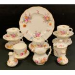 A Royal Crown Derby Posies pattern tea service, for six; similar salt and pepper pot; preserve