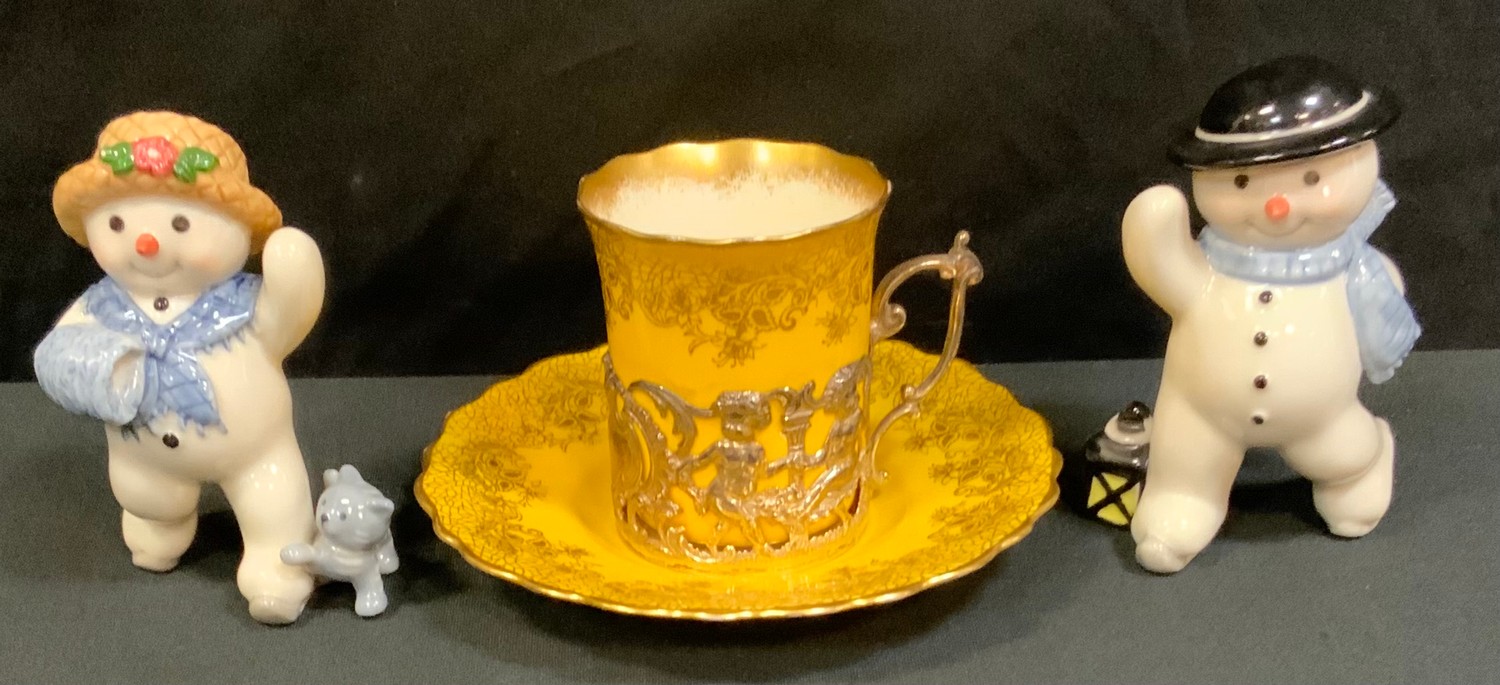 An Edward VII silver mounted Aynsley yellow and gilt decorated coffee can and saucer, Chester