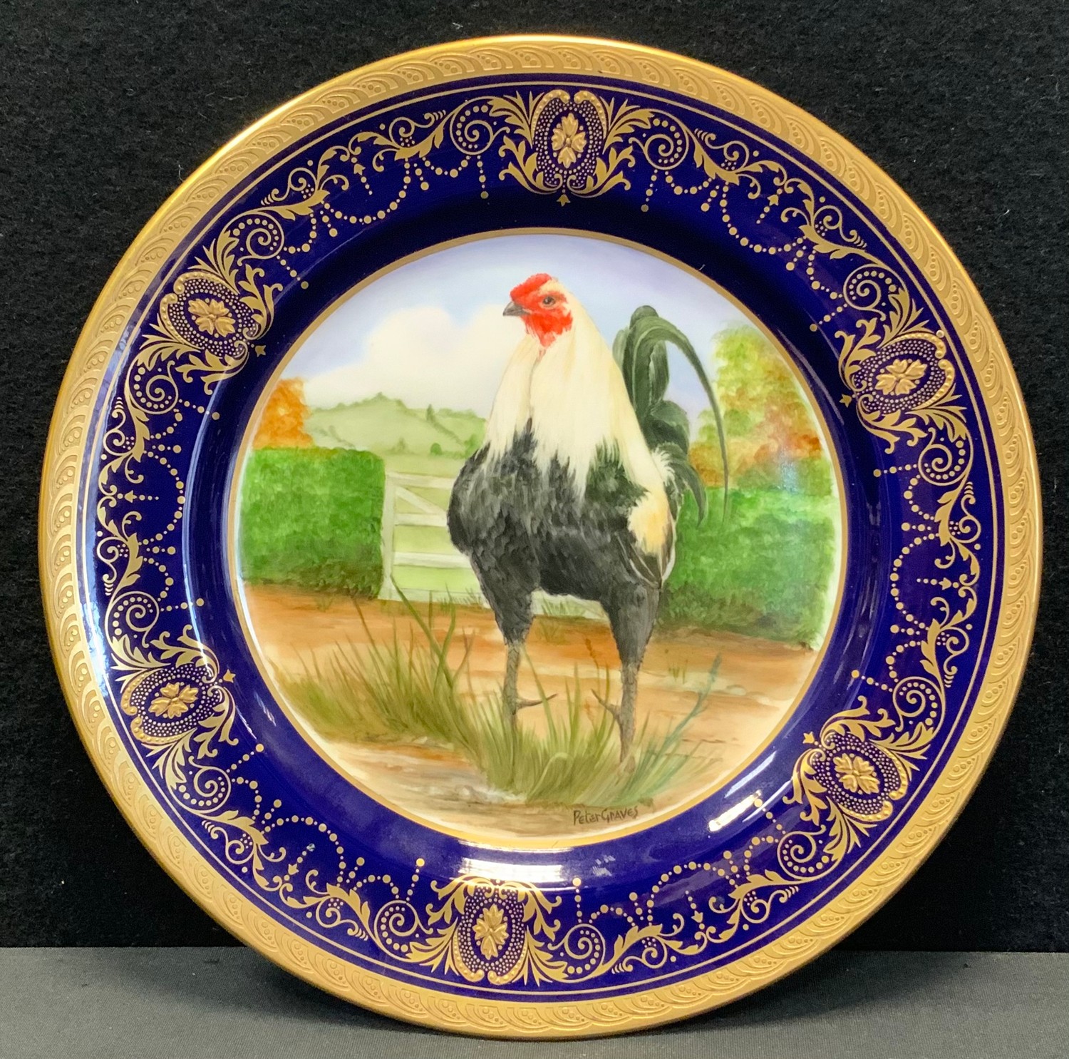 Peter Graves - a hand painted circular plate, Rooster Walking, signed, 23cm diameter