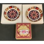 A pair of Royal Crown Derby 1128 imari circular trinket dishes; posies napkin, each boxed (3)