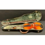 An early 20th century violin, two piece back, double lined purfling, back 35.5cm long, with