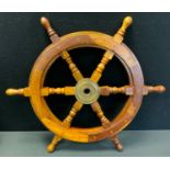 A contemporary brass and teak stained ship's wheel, 60cm diam