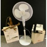 A Leica projector; floor standing fan; Antec Minuet 300 computer tower case etc