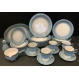 A Denby pale blue and white part dinner and tea service, unmarked,