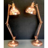 A pair of contemporary gilt metal angle poise type side lights