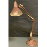 A desk top angle poise lamp, possibly Herbert Terry, traces of original orange colour evident