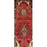 A Nomadic Carpets hand knotted Hamadan rug, approx 300cm x 110cm