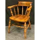 Ash and Elm smokers bow, turned spindles, saddle seat, double `H` stretchers, turned legs, 88cm high