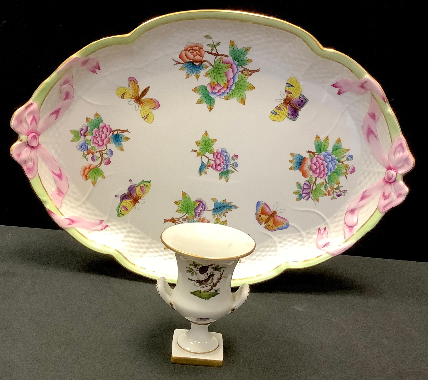 A Hungarian Herend hand painted oval tray, painted with butterflies and flowers, tied ribbon