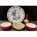 A Chinese export plate, decorated in underglaze blue, c.1770; a Cantonese saucer dish, c.1880; a