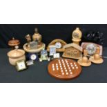 A vintage Bentima mantel clock; others, treen table lamp' tea caddy, pair of candlesticks, solitaire