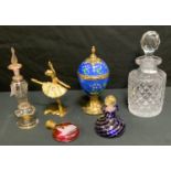 A House of Faberge musical egg on stand; a Palais Royal gilt metal ballerina; a cranberry glass