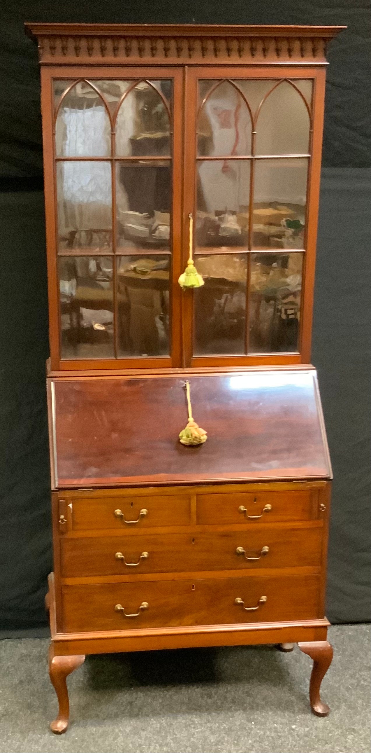 An early 20th century mahogany bureau bookcase, moulded cornice above a pair of astragal doors