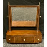 A George III mahogany dressing table looking glass, rectangular mirror above one long drawers,
