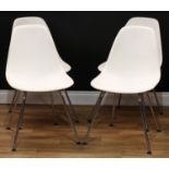 Modern Design - a set of four DSX chairs, designed by Charles and Ray Eames, and produced by