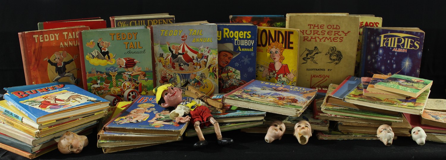 A collection of 19th century bisque dolls heads; a Pelham Puppet, Pinocchio; Books - children's