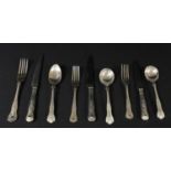 A silver part set of Kings pattern flatware, comprising table fork, spoon, pair of salad forks, pair