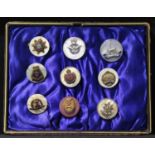 A collection of nine mother of pearl military sweetheart brooches