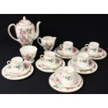 A Wedgwood Charnwood pattern coffee service, for six, comprising pedestal coffee pot and cover,