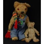 A mid 20th century mohair jointed bear, vertical stiched snout, velvet pads, 39cm high, c.1945;