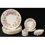 An Abbeydale Hazelwood pattern trinket pot and cover, seven dinner plates, three side plates, shaped