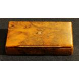 A 19th century bird's eye maple snuff box, the hinged cover inlaid with a rose gold oval central