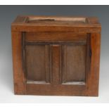 A 19th century oak ballot box, constructed from salvaged sections of period panelling, 26cm high,