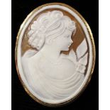 A 9ct gold mounted oval cameo brooch, carved with a bust length portrait of a female beauty, 5cm