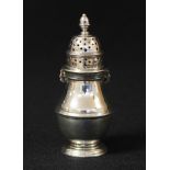 A George V silver baluster pepper or pounce pot, of 18th century design, pierced bayonet fitting